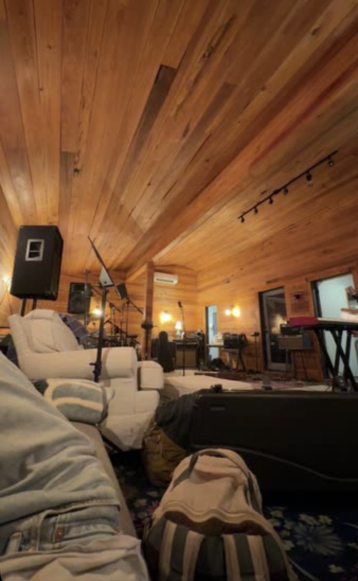 Beatline artist rehearsing in a wood-lined studio room